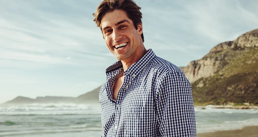Smiling man on a beach